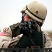Army Sergeant Trains with Machine Gun at Uzbekistan Air Base