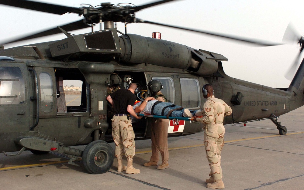 Medics Evacuate Casualty by Black Hawk Helicopter at Baghdad Airport