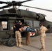 Medics Evacuate Casualty by Black Hawk Helicopter at Baghdad Airport