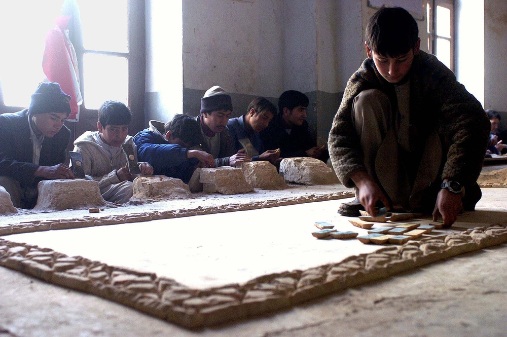 Afghan Boys Earn Income Restoring Blue Mosque