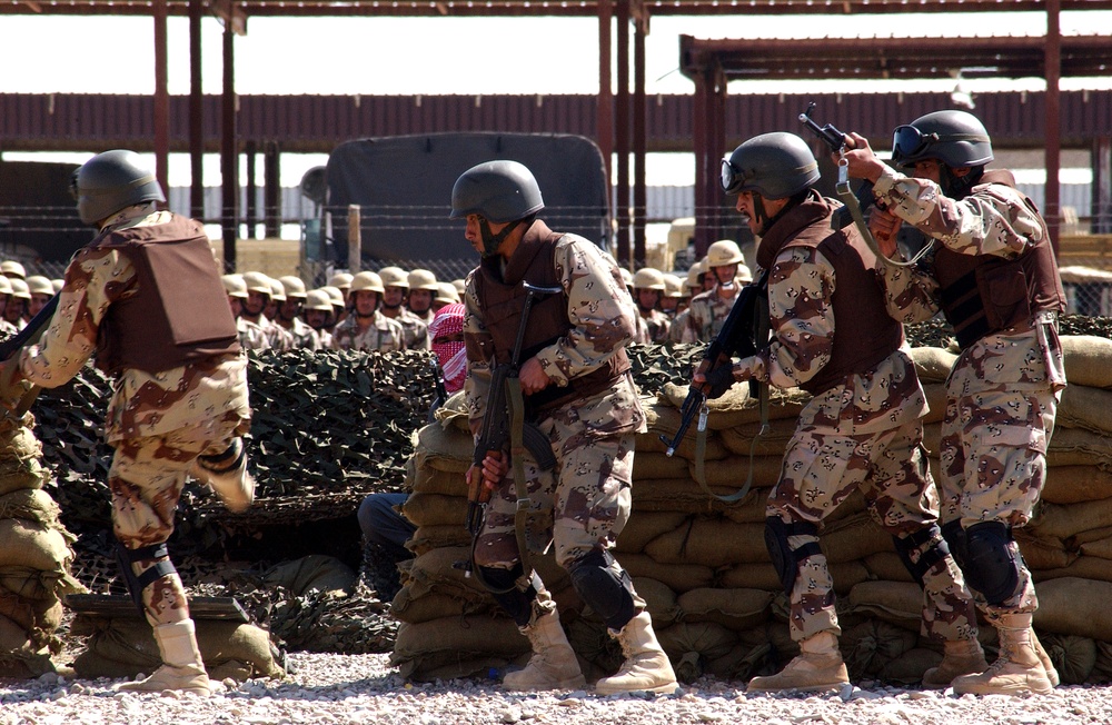Iraqi Troops Showcase Storming Tactics at Graduation Ceremony