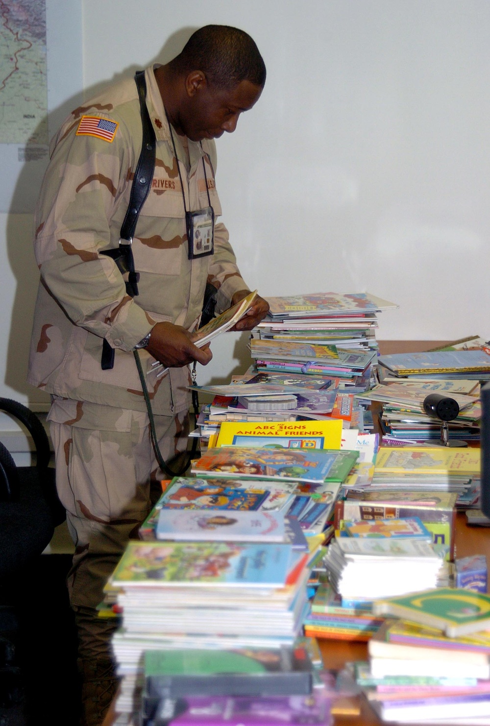 Deployed Soldier Reads to Children Through Military Program