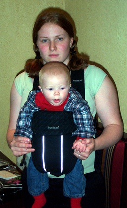 Widow Carries Son at Gold Star Wives Luncheon