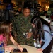 Marine Lt. Col. Presents Military Coin to Country Singer Chely Wright