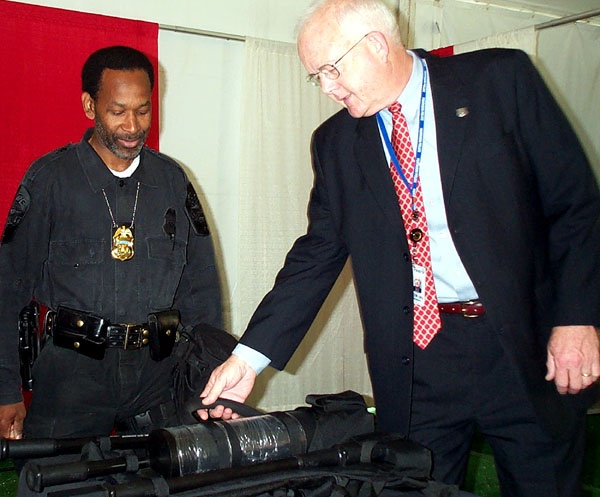 Pentagon Force Protection Agency Director Inspects Breaching Tool at Public Service Exhibit