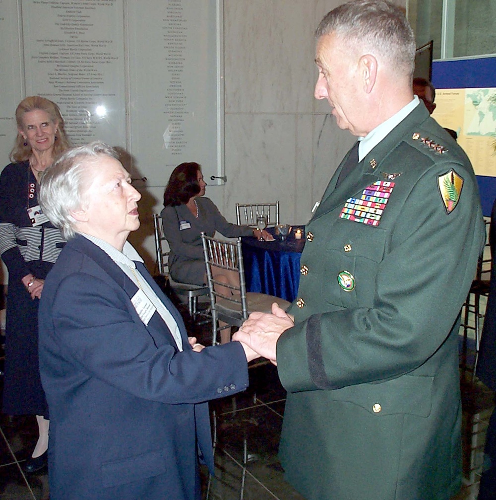 Retired Air Force General Greets Army General at Women's Memorial