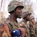 Army Spc. Carlos Melvin Holds Lowered American Flag After Training in Germany