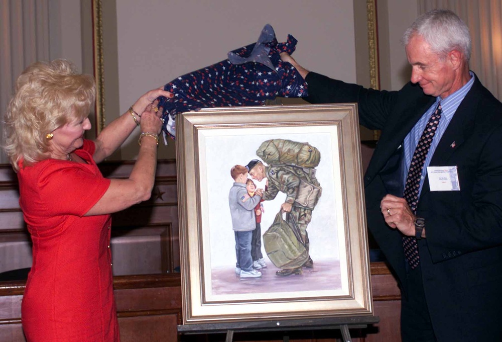 Connie Clark Unveils ASYMCA Painting with Artist Jim Ryan