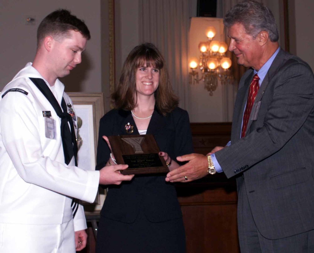 Retired Army General Honors Volunteer Couple at ASYMCA Luncheon