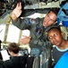 Young Visitors Explore C-130 Cockpit at Joint Service Open House
