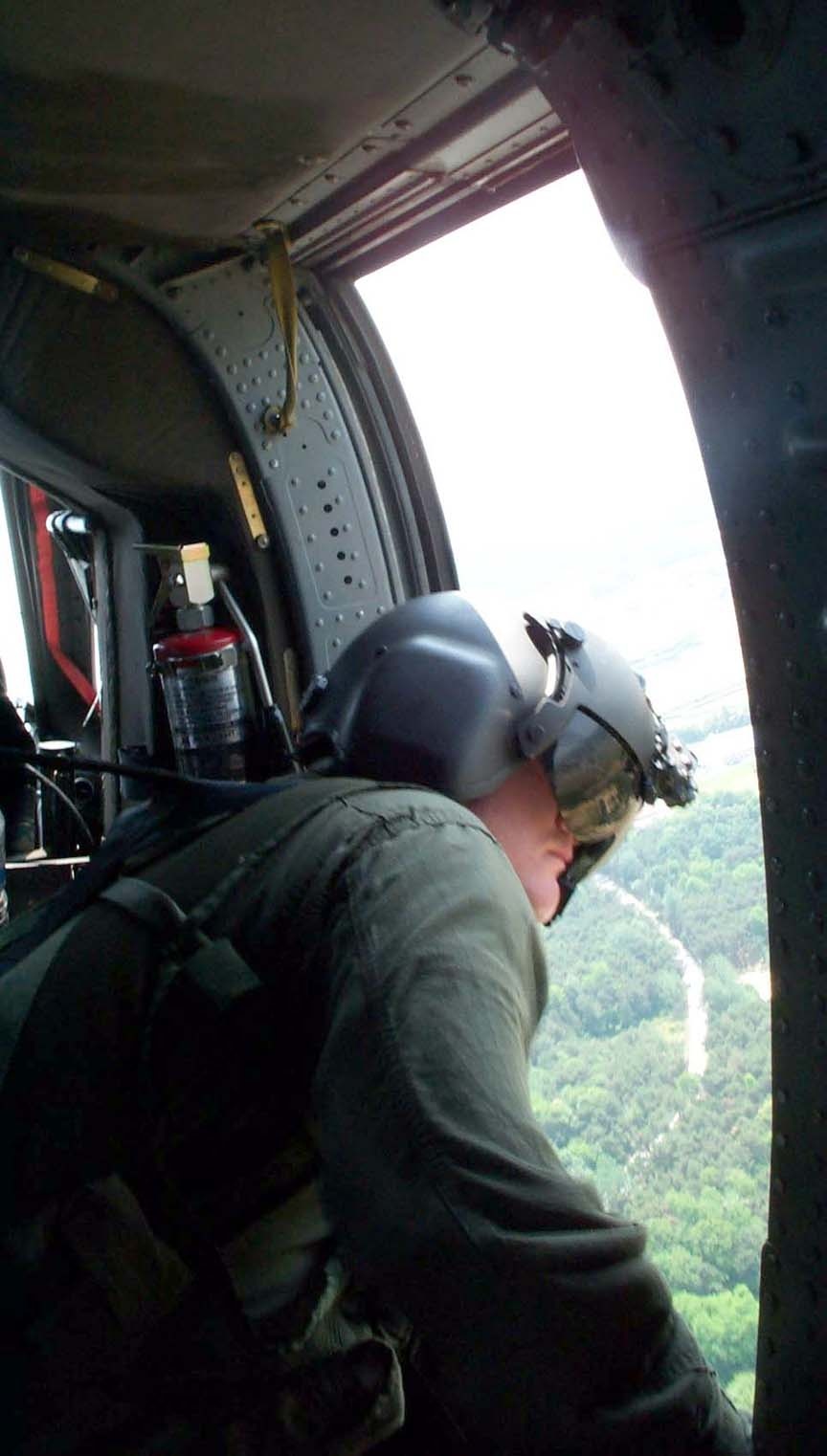Army Spc. Keeps Watchful Eye During Wolfowitz Flight to DMZ