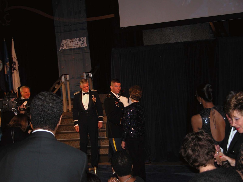 First Lady Honors Soldier at Service to America Summit