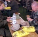 Soldiers Share Humanitarian Rations at Training Range in Germany