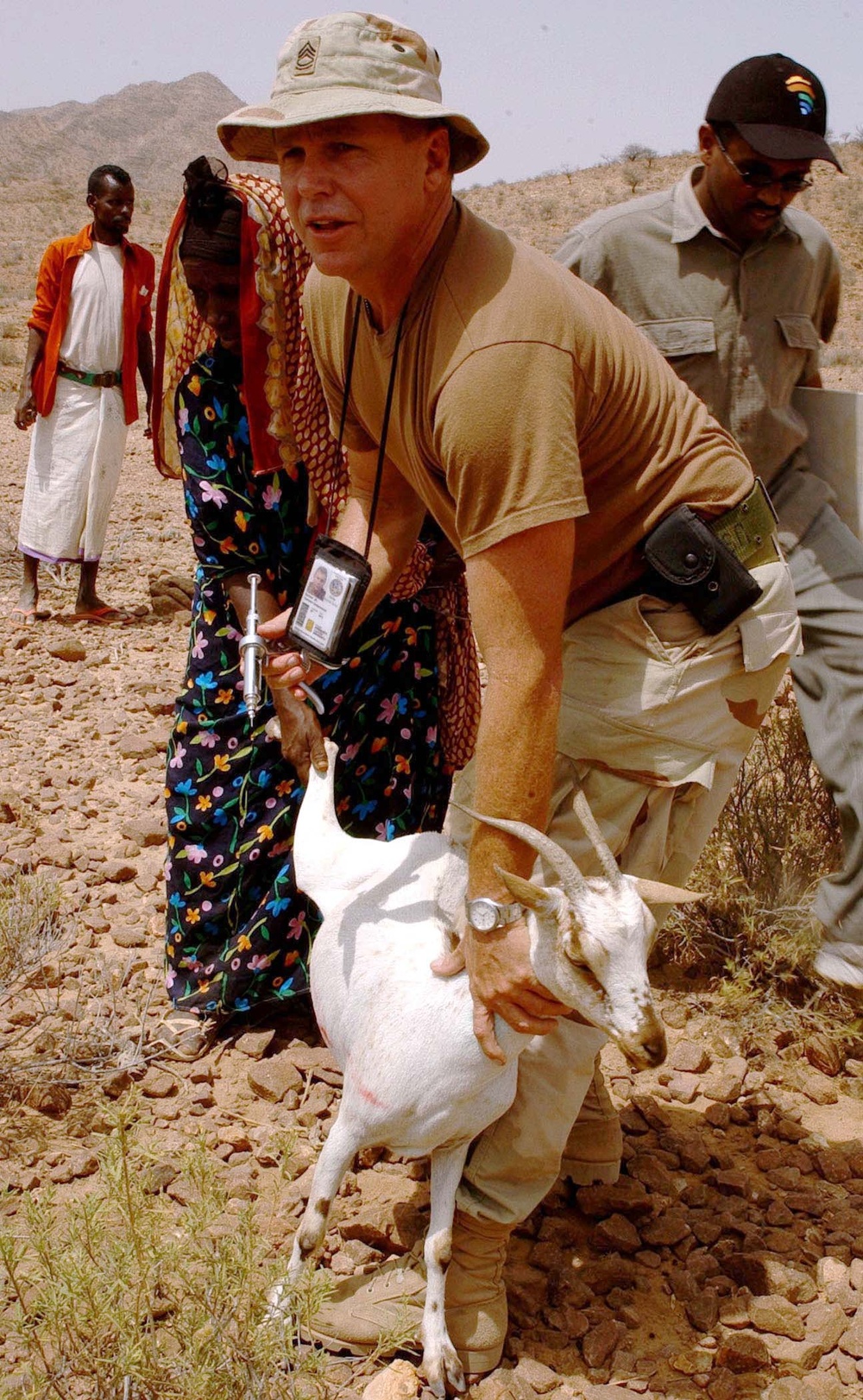U.S. Army Sergeant Treats Goat for Parasites in Djibouti