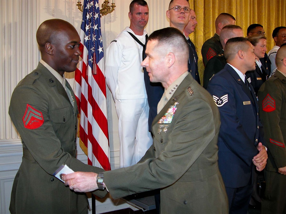 Marine Vice Chairman Congratulates Corpsman on Re-Enlistment at White House Ceremony