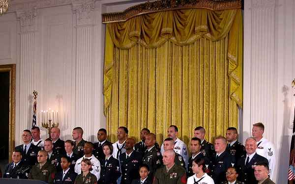 Military Members Reaffirm Commitment at White House Ceremony