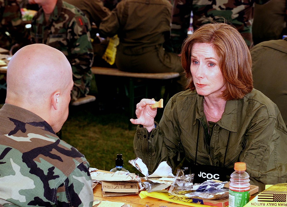 Journalist Chats with Soldier Over Humanitarian Rations in Germany