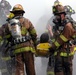 Firefighters Assist Injured Volunteers in Pentagon Decontamination Exercise
