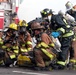 Firefighters Assist Injured Volunteers in Pentagon Decontamination Exercise