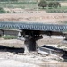 U.S. Forces Repair Bombed Bridge Near Saddam Hussein's Palace in Tikrit