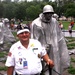 Korean War Veteran Poses at Memorial