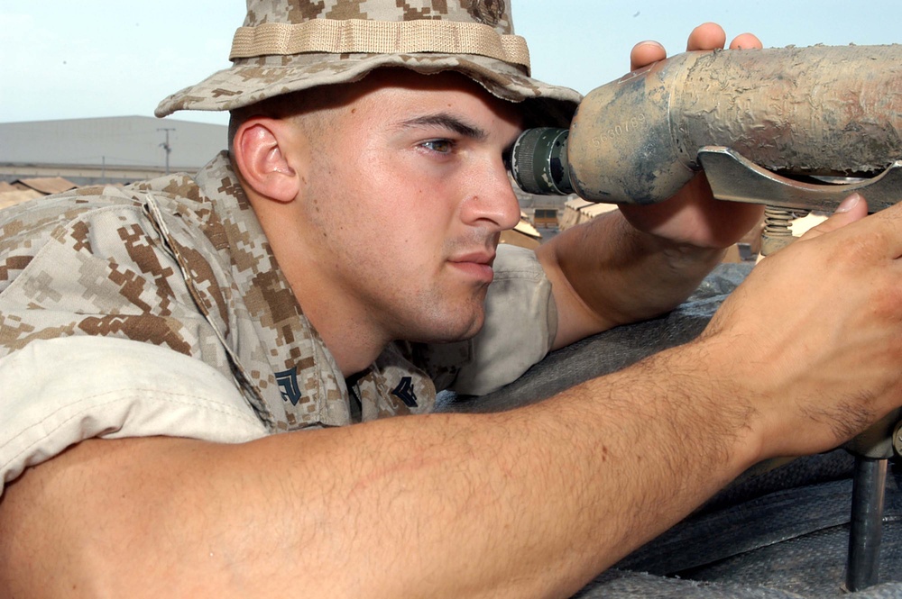 Marine Sniper Scans Terrain at Camp Lemonier in Djibouti