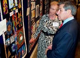 Wolfowitz, Curator Examine 9/11 Memorial Quilts at Arlington