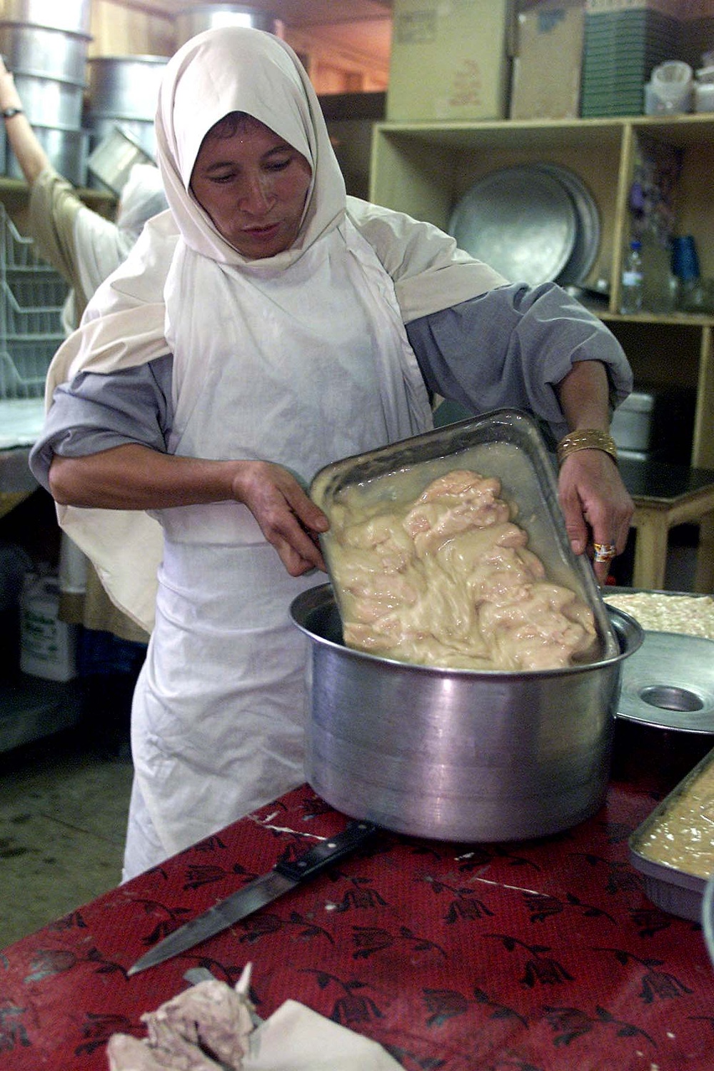Afghan Woman Hired to Assist U.S. Army Dining Facility in Bamian