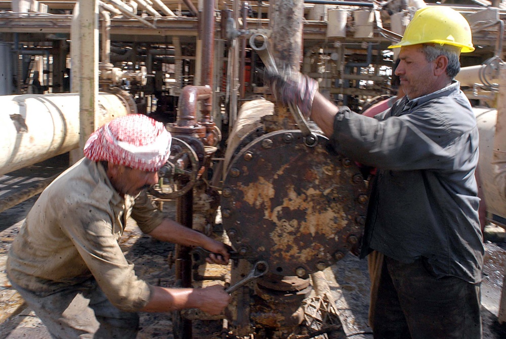 Rebuilding Iraq's Economy: Qayyarah Oil Refinery Workers Toil to Revive Country's Energy Sector