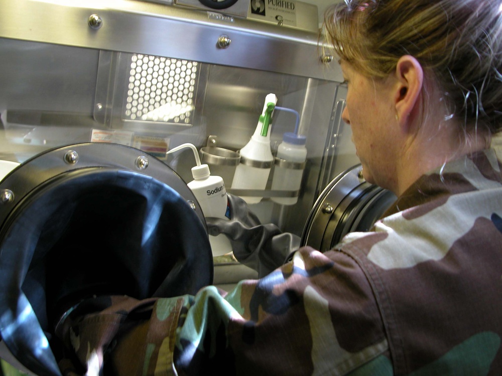 Air Force Officer Conducts Chemical and Biological Analysis During WMD Exercise