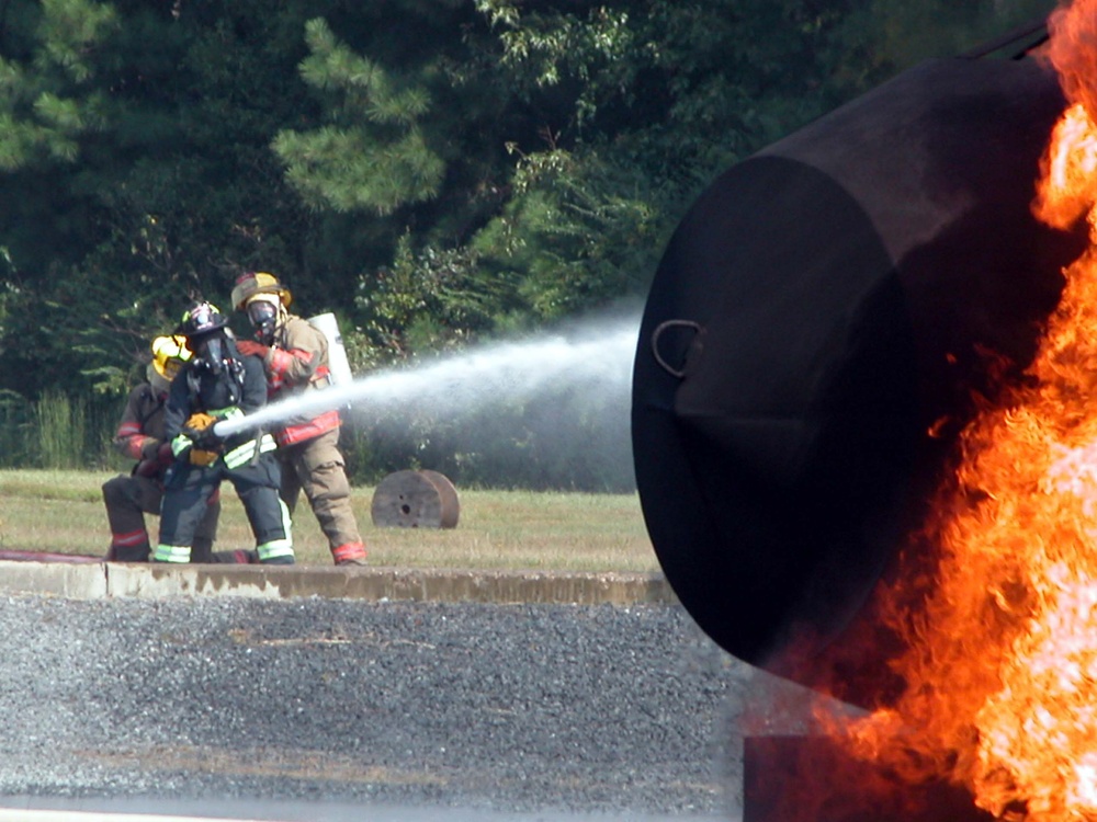 Firefighters Battle Simulated Plane Crash, Decontaminate Victims at Dobbins Air Reserve Base Exercise