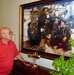 Retired Navy SEAL Admires Painting of Square Rigger Navy at Armed Forces Retirement Home