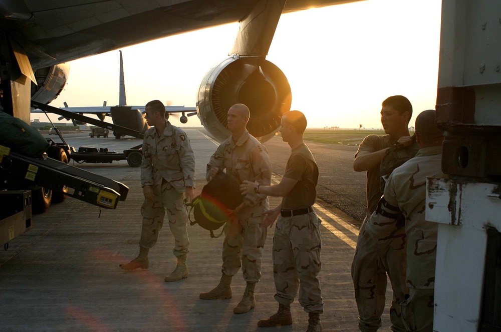 Soldiers Assist in Unloading Luggage After R&amp;R Leave