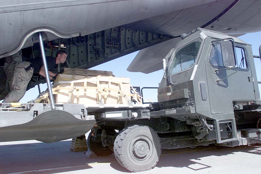 Airmen Unload Supplies from C-130 at Manas Air Base for Operation Enduring Freedom