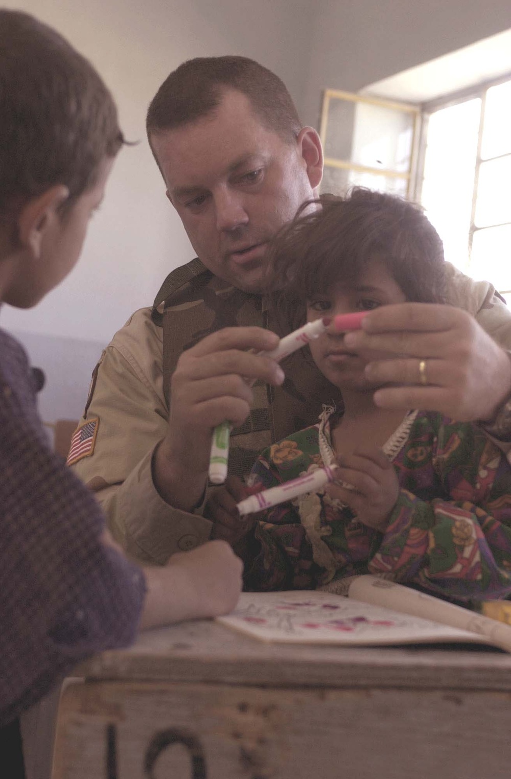 Nebraska National Guard Soldiers Donate School Supplies to Iraqi Children