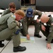 C-130E Crews Discuss Attack Routes for Simi Fire Retardant Drops