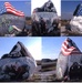 Iowa Artist Paints Patriotic Scenes on Boulder for Memorial Day
