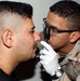 U.S. Physician Assistant Examines Iraqi Police Applicant