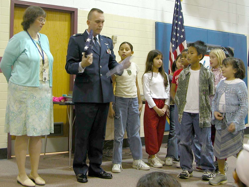 Baghdad Buddies: Air Force Major Presents U.S. Flag to Elementary School Students