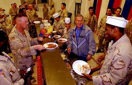 President Bush Serves Thanksgiving Dinner to Troops in Iraq