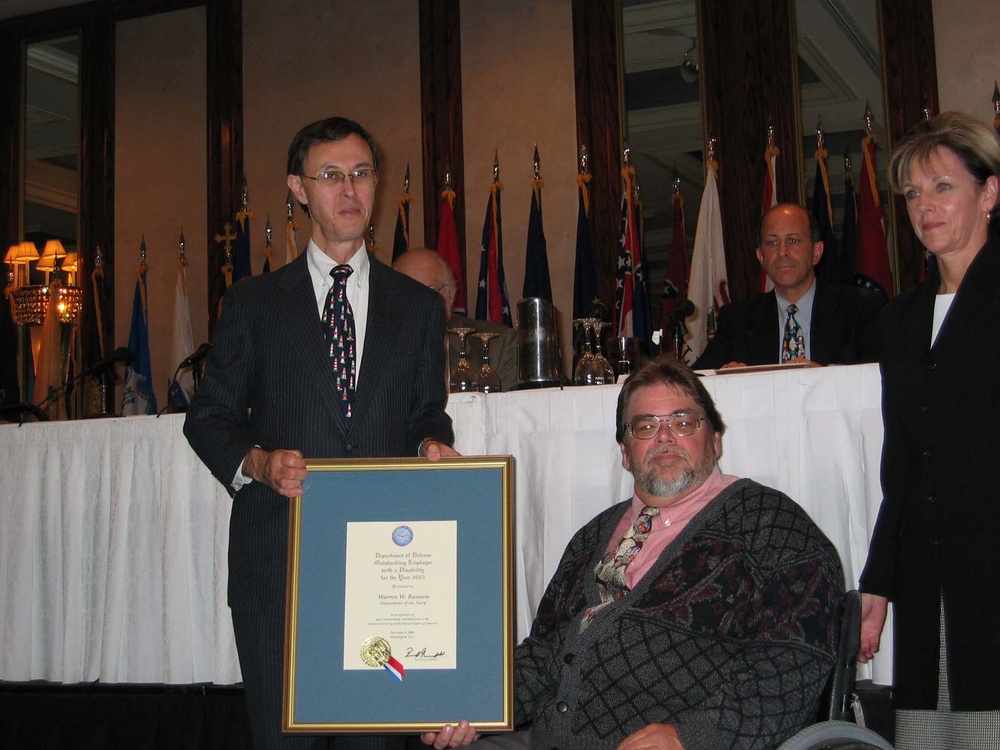 Navy Writer-Editor Honored for Overcoming Disabilities