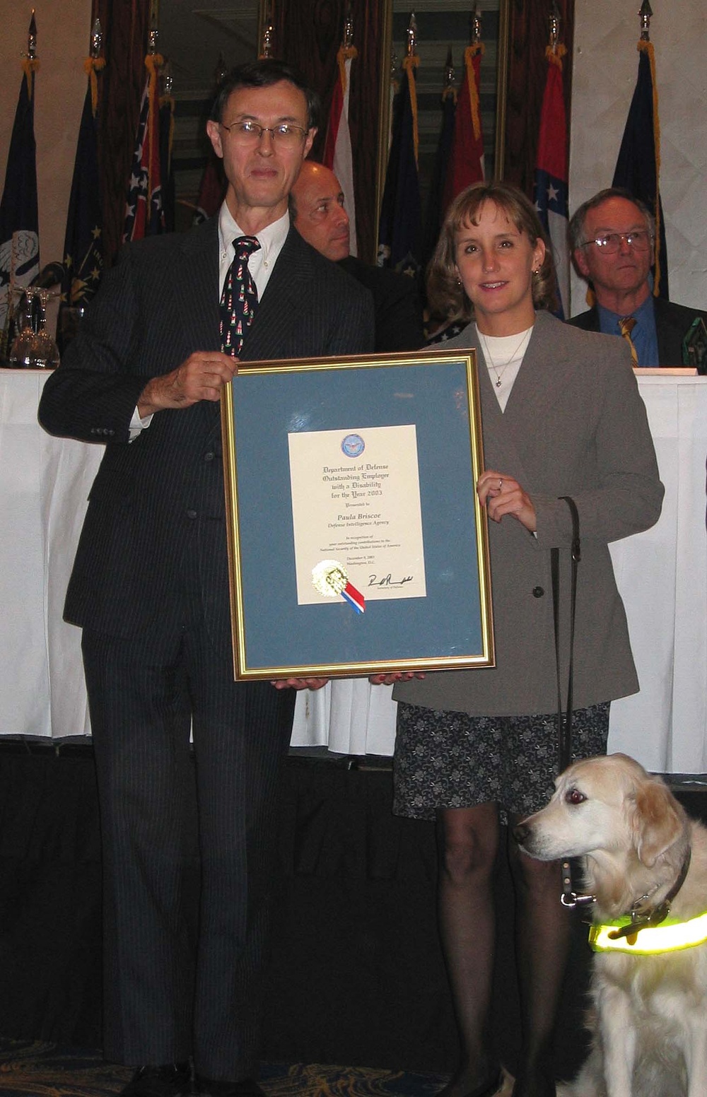 Intelligence Officer Honored for Outstanding Work with Disability Service Dog