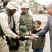 Soldiers Distribute Local Newspaper to Iraqi Citizens