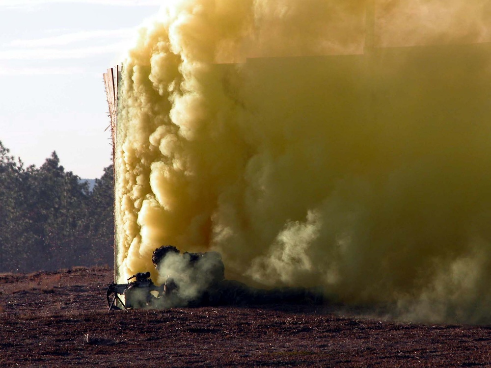 Paratrooper Navigates Smoke-Filled Urban Warfare Exercise
