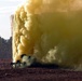 Paratrooper Navigates Smoke-Filled Urban Warfare Exercise