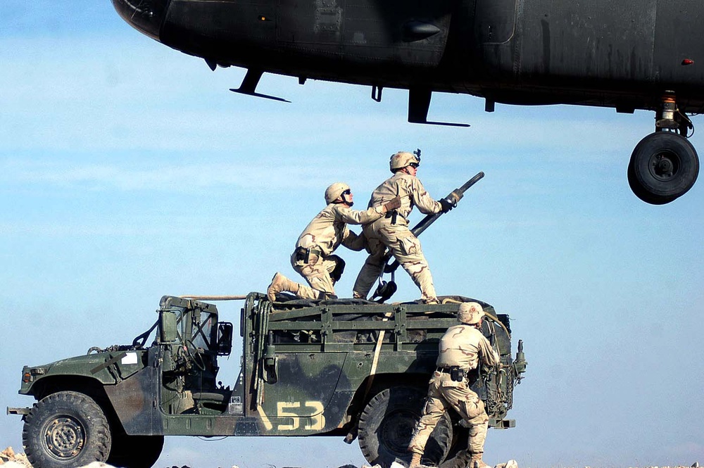 101st Airborne Soldiers Slingload Humvee for Redeployment