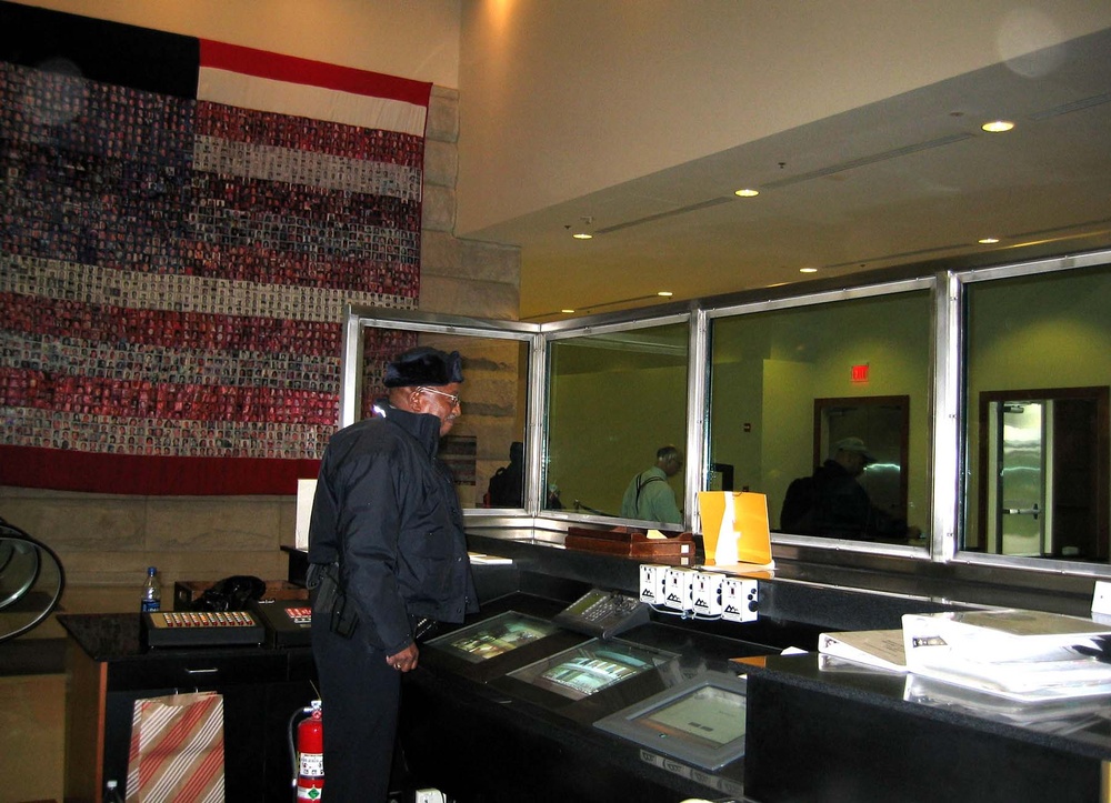 Pentagon Police Officer Monitors Security at Metro Entrance Facility