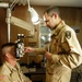 Army Ophthalmologist Examines Senior Noncommissioned Officer in Afghanistan