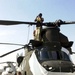 Soldiers Prepare Chinook Helicopter for Shipment in Kuwait