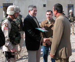 Wolfowitz Presents Certificate of Occupancy to Mosul Resident